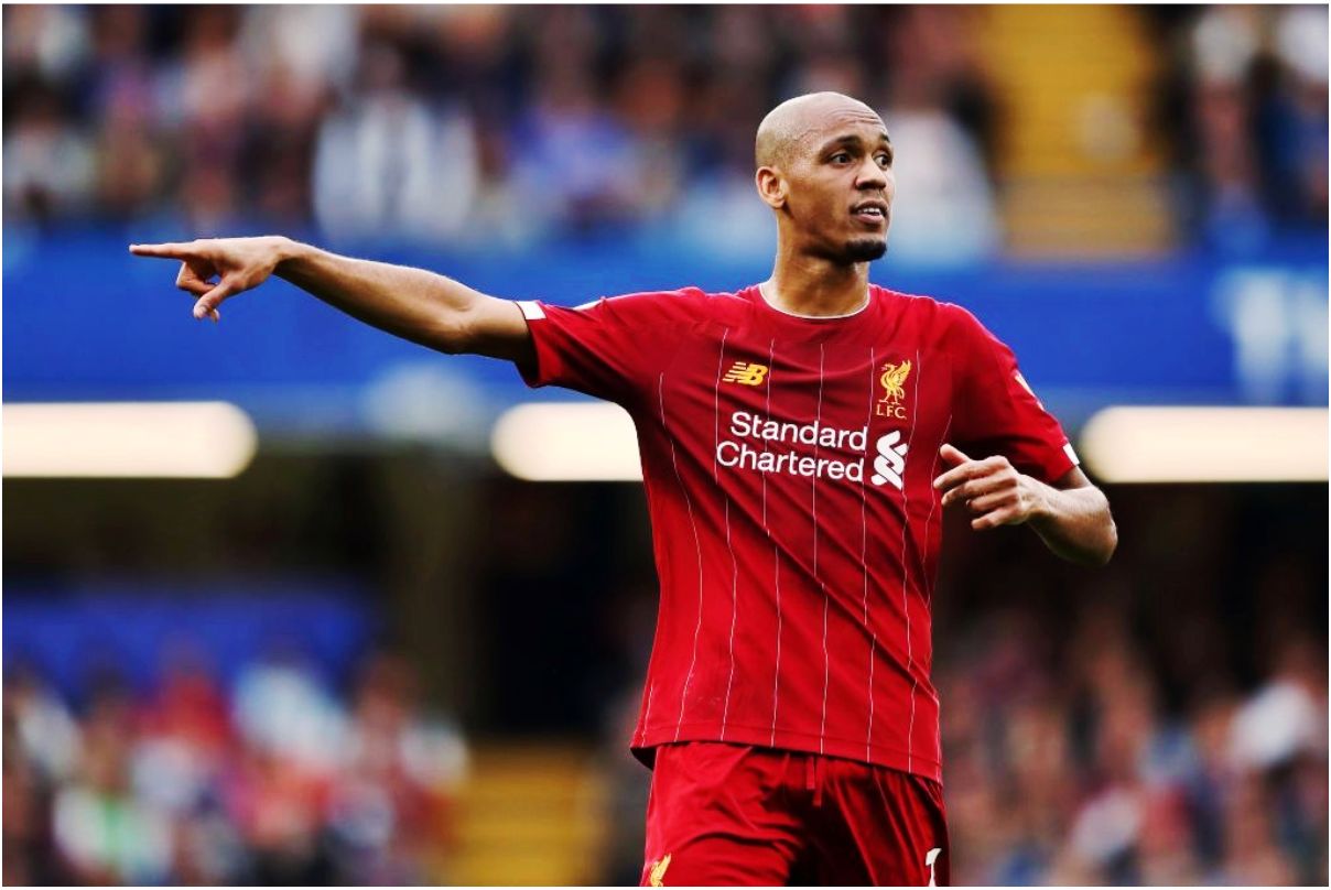 Football player Fabinho - A journey to win the hearts of fans with his exceptional skills and sharp tactics.
